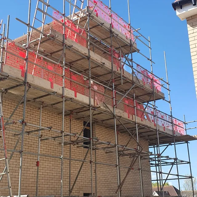 new house with scaffolding