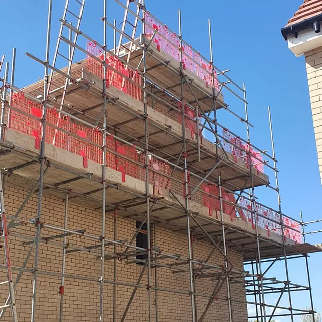 new house with scaffolding